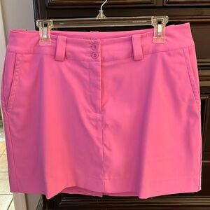 EUC Nike Golf Dri-fit pink skirt. Button & zipper waist. Shorts under. Size 10